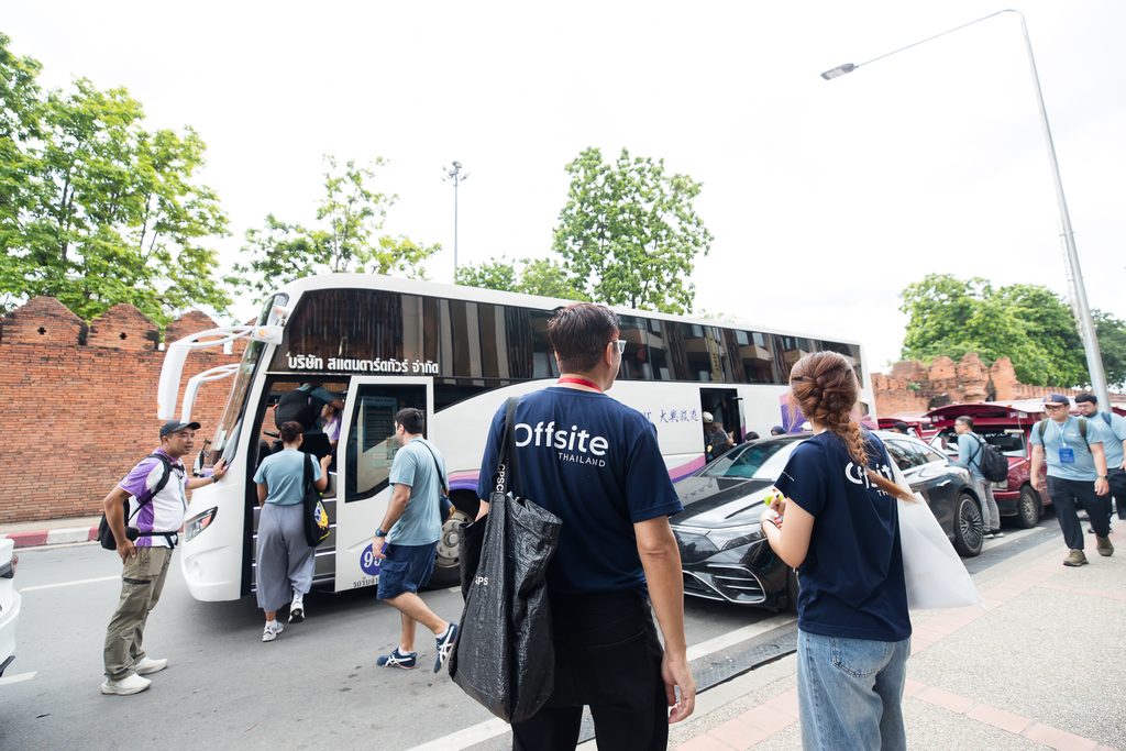 offsite thailand team checking all members are getting on the bus