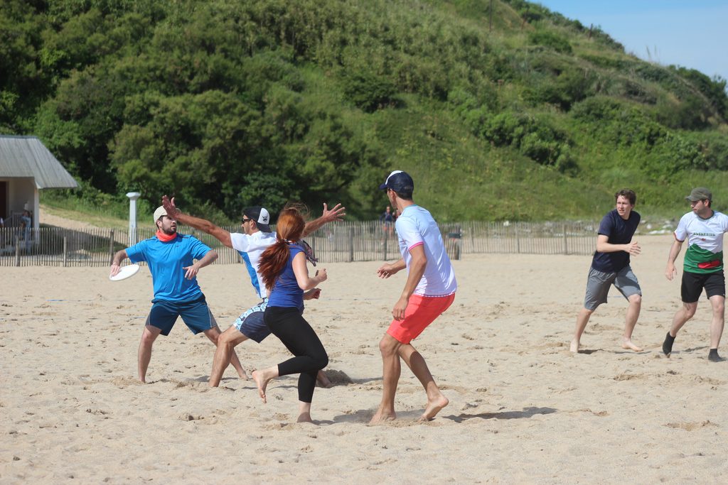 Co-workers participating in outdoor corporate team building activities on the beach in Hua Hin, Thailand.